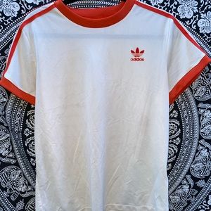 Orange and white adidas shirt